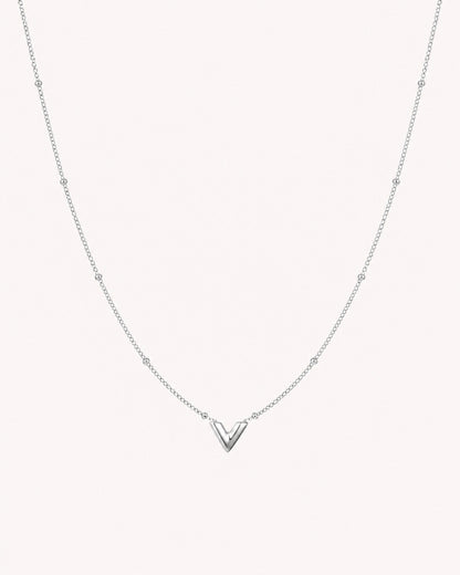Ketting met V hanger en bolletjes