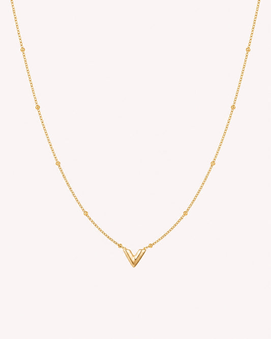 Ketting met V hanger en bolletjes