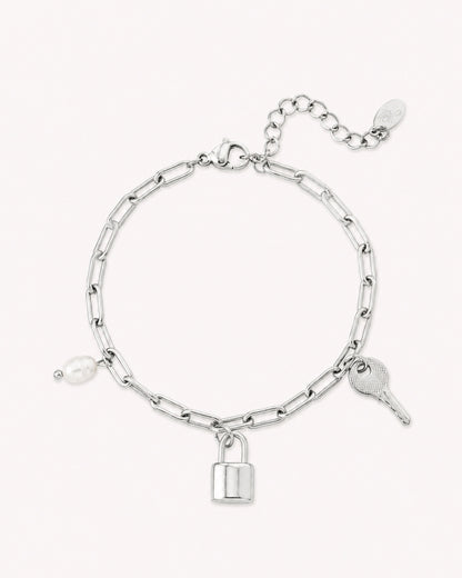 Schakelarmband met bedels en parel