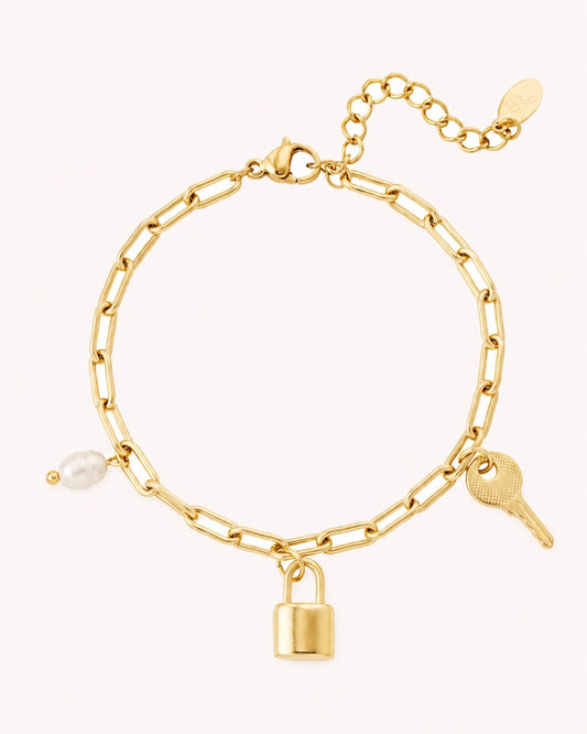 Schakelarmband met bedels en parel